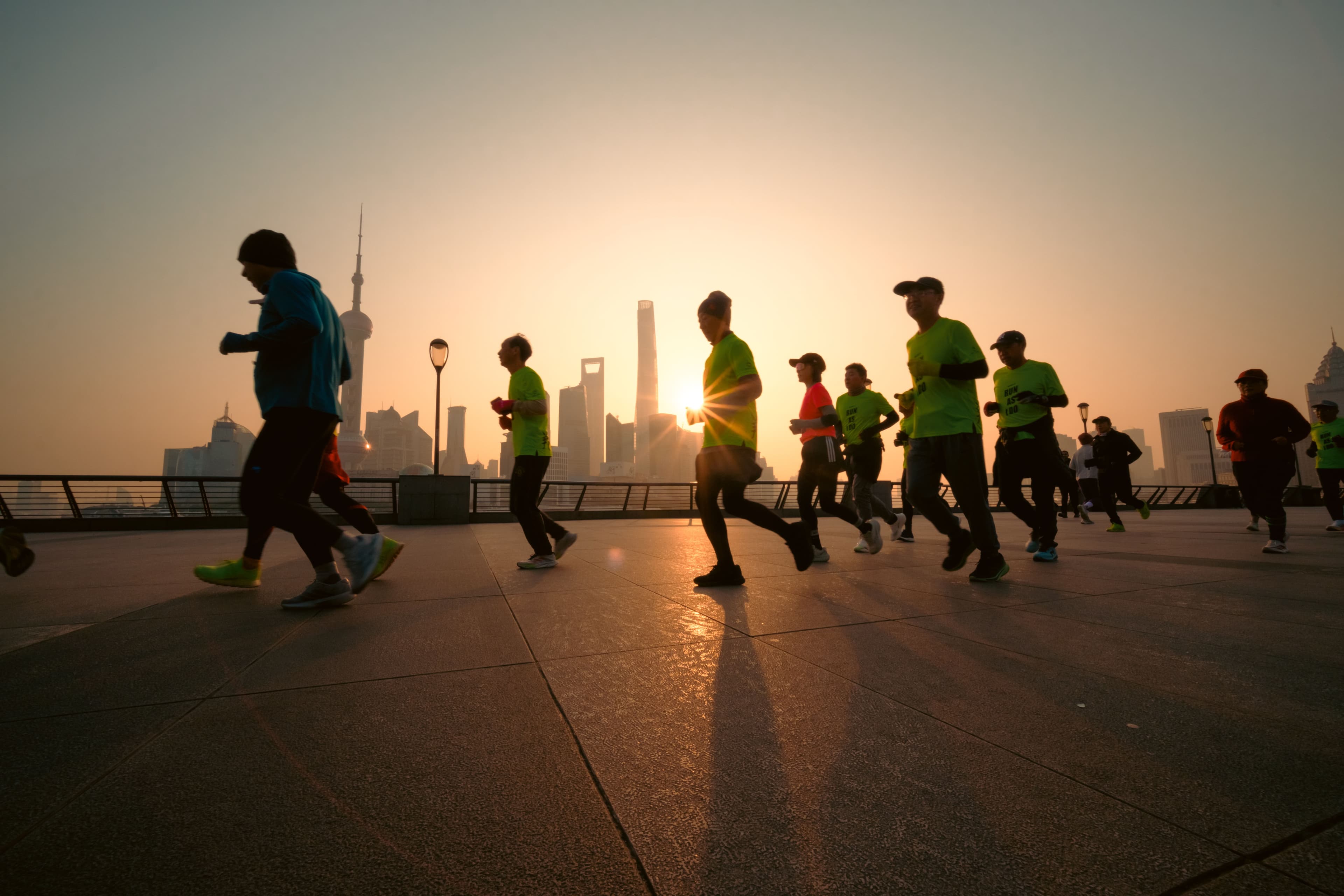 Group of runners on a morning trail